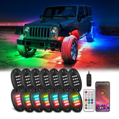 China 256 Chasing Effect Modes 14Pods Dream Color Rock Lights with Remote APP 12V 36W for Trucks Chasing Underbody Lights Waterproof for sale