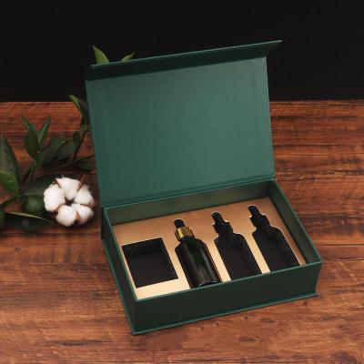 China Recyclable Custom Essential Oil Bottle Logo Cardboard Magnetic Paper Packaging Cosmetic Gift Box With Magnet Closure for sale