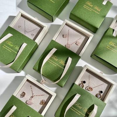 China Recyclable Portable Custom Green Drawer Paper Cardboard Sliding Jewelry Boxes Gift Boxes With Ribbon Handle for sale