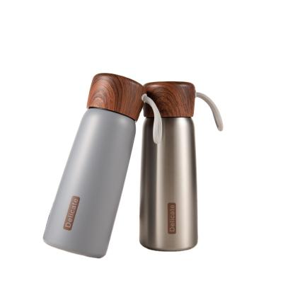 China 2020 PORTABLE Vacuum Flask Model Lid 500ml Stainless Steel Wall Wooden Milk Double Vacuum Flask Insulated for sale