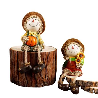 China Worlwide two sets of resin scarecrow leg harvest hanging sculpture suitable for autumn home decoration for sale