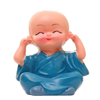 China Southeast Asian cartoon figure monk Sami statue the small ornaments small Buddha pottery Buddha statue resin folk crafts for sale