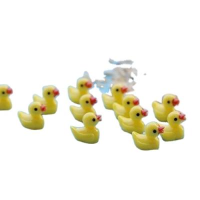 China Creative Yellow Worldwide Landscape Decoration Resin Crafts Small Duck Toy Pendant Ecological Bottle Micro for sale