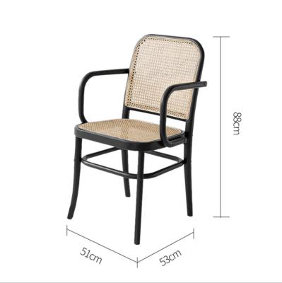 China Contemporary Nordic Classic Ash Wood Solid Wood Armchair Dining Chair Receives Guest Chair Stylist The Chair Cane Is Woven for sale