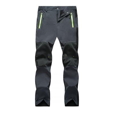 China Breathable Waterproof Windproof Hiking Sports Wear Pants Elastic Climbing Pants For Women And Men for sale