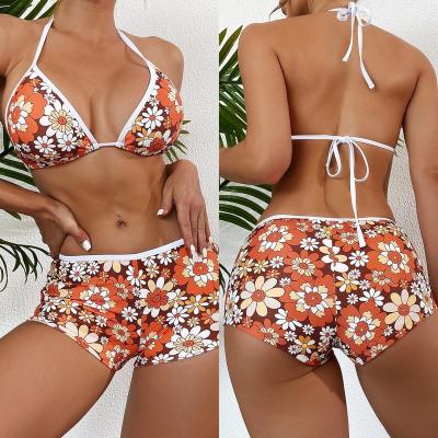 China 2023 Custom Windproof New IN Stock Floral Print Bikini Beachwear Triangle Halter Swimsuit Women Two Piece Boxers Shorts Swimwear for sale