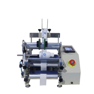 China Hot Vending Glass Round Bottle Semi Automatic Tabletop Adhesive Plastic Labeling Machine for sale