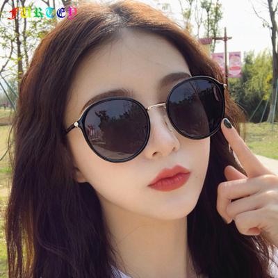 China Fashion Sunglasses 2021 New Fashion Round Sun Glasses Women Travel Transparent Sunglasses JH18035 Wholesale Custom Logo for sale