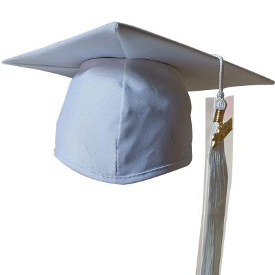 China 2021 Graduation Season White Cheap Polyester High School And College Adult Graduation Hat With Tassel for sale