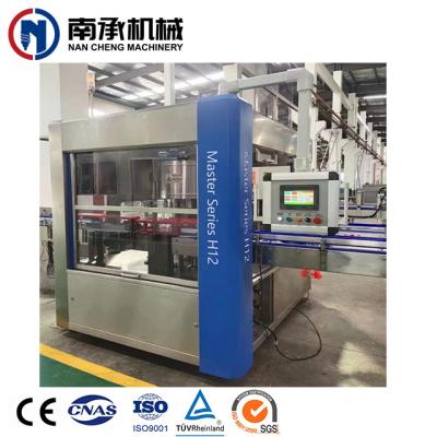 China Beverage Automatic Hot Melt Adhesive Labeling Machine OPP Rotary Labeling Machine For Bottle Water for sale