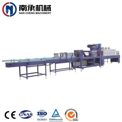 China Automatic Small PE Film Beverage Bottle Food Shrink Wrapping Packing Machine for sale