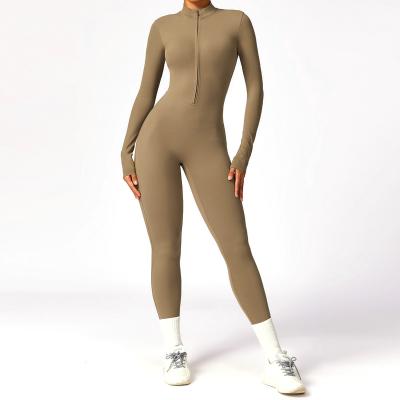 China Breathable Customized Sexy Women'S Bodysuit Sport Clothes Half Zip Gym One Piece Yoga Fitness Women Workout Jumpsuit for sale