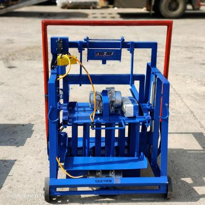 China building material shops cheap cement egg laying brick block making machine mini hempcrete diesel hollow brick making machine high production for sale