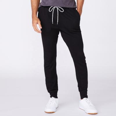 China OEM Black Mid Waist Drawstring Jogger Pants Solid Color Mens QUICK DRY Cotton Plain Street Casual Trousers Comfort Basic for sale