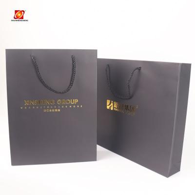 China New Recycled Materials Design Black Mylar Kraft Print Bags Custom Printed Jewelry Gift Luxury Shopping Paper Bag With Rope Handle for sale