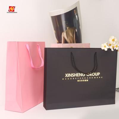 China Recycled Materials Multifunctional Normal Paper Bag With Logo Printing Cloth Bags for sale