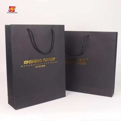 China New Recycled Materials Gift Packaging Shopping With White Round Design Your Own String Tissue Paper Bag for sale