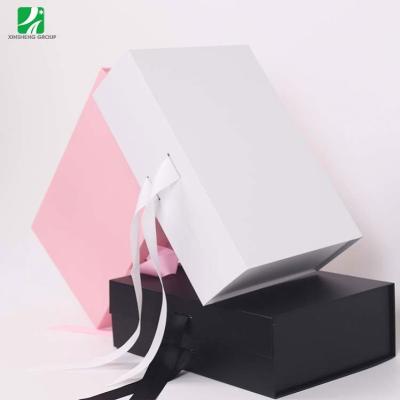 China New Design Biodegradable Rose With Ribbon Magnetic Bow Cosmetic Gift Paper Box for sale