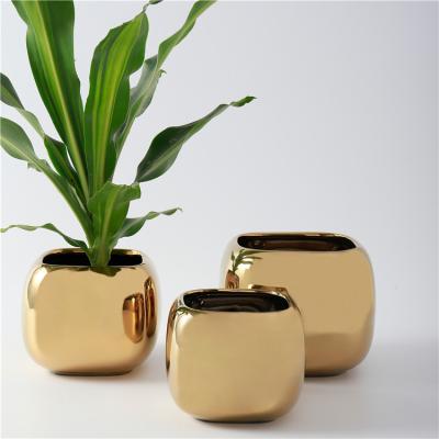 China Hot Sale Europe Indoor Outdoor Decorative Home Decor Gold Plating Ceramic Planters Flower Pots for sale