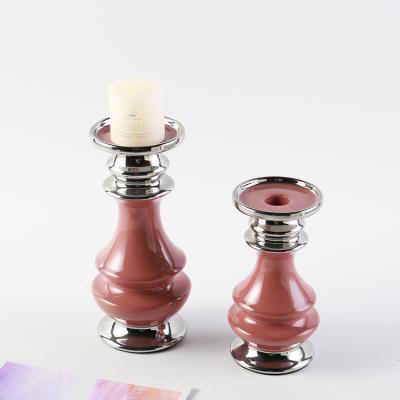 China Customized Cheap Modern Home Decor Shiny Glazed Pink Modern Candle Holder Unique Elegant Small For Wedding Event Decoration for sale