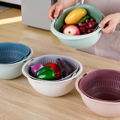 China Sustainable Household Rotating Double Kitchen Plastic Creative Fruits And Vegetables Folding Kitchen Sink Plastic Drain Basket for sale