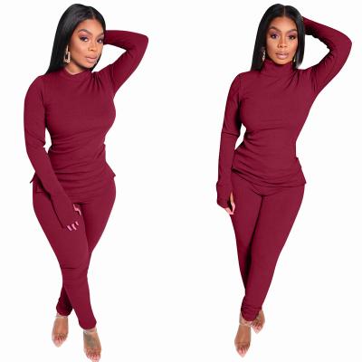 China 2021 New Trend Solid Color African Sports Fitness Training QUICK DRY Two Pieces Of Tracksuit Women Clothing Sets for sale