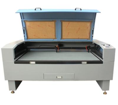 China Online store hot sale low price CO2 wood fiber laser cutting machine water cooled for sale