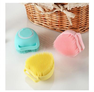 China Stocked Pet Grooming Brush New Soft Silicone Massaging Brush Cat Hair Bath Comb Brush Dog Massage To Clean Artifact for sale