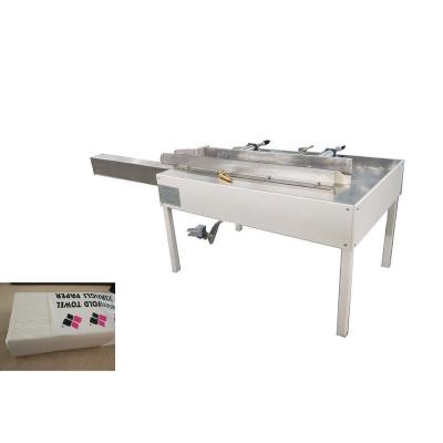 China Hotels CE Low Price Manual N Folding Hand Towel Wrapping Machinery Price for sale