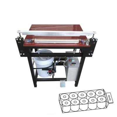 China Hotels CE Low Price Easy Operation Manual Package Toilet Paper Roll Sealing Machine for sale