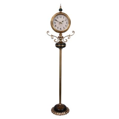 China Antique Style 12 inch luxury living room creative decoration metal vertical clock fashion crystal glass handicraft silent floor clock for sale