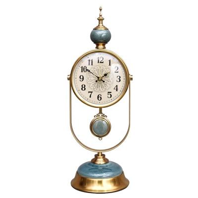 China Calendars 8 inch living room fashionable retro desk clock American antique gold-plated ceramic swing desktop modern simple desk clock for sale