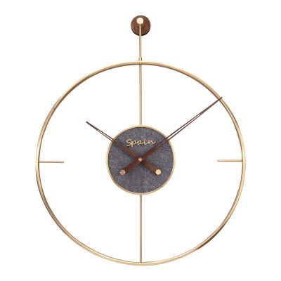 China Minimalist 24 inch Christmas Gift Living Room Decoration Modern Spanish Style Clock Art Fashion Brass Luxury Silent Wall Clock for sale