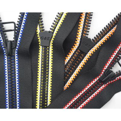 China Other classic type 3 zipper tape long chain zipper 5 8 chain plastic resin zipper for sale