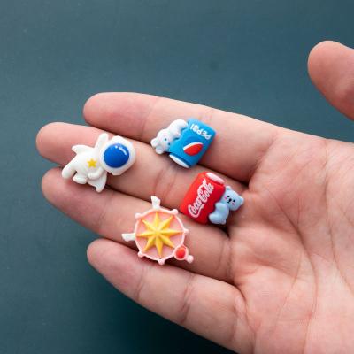 China New DIY Eco-friendly Resin Accessories Astronaut Drinks Rudder Silicone Key Chain Pendant Handmade Materials for sale