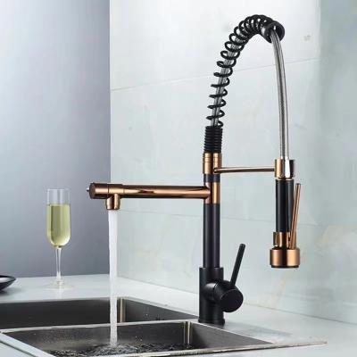 China Other Gold and Two Black Hose Brass Hot and Cold Deck Mounted Kitchen Sink Faucet Mixer for sale