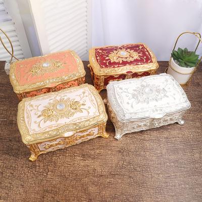 China Classic European Creative Embossed Mirror Flip Storage Box With Lock Jewelery Packaging Box Necklace Earrings Jewelry for sale