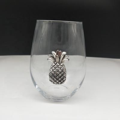 China Custom Logo Pineapple Metallic Design 20oz Stemless Metal Wine Glass for sale