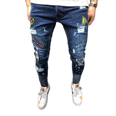 China European and American style hot men's hip-hop feet badge thin breathable pants high-end tight-fitting ripped men's new jeans for sale