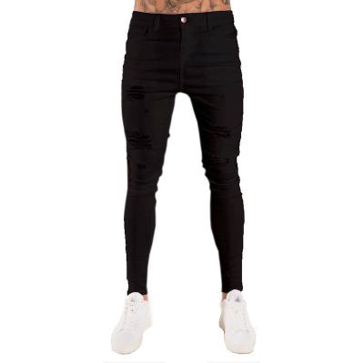 China 2021 European and American foreign trade men's feet white slim fit pants Europe breathable new station ripped paint loin jeans men for sale