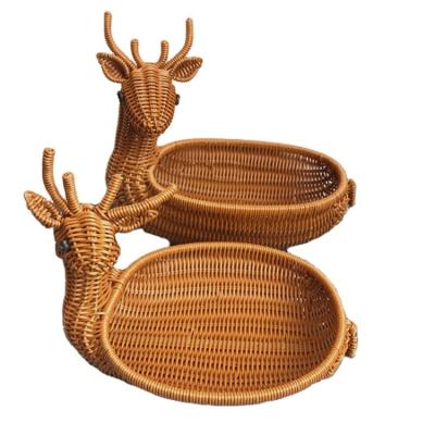 China Traditional Hand Made Gift Home Decor Fruit Bread Storage Deer Shape Rattan Animal Basket for sale