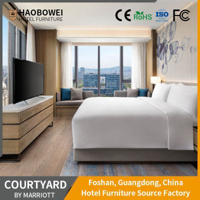 China Curved Backrest Foshan 4 Star King Size Bedroom Set Marriott Resort Hotel Furniture for sale