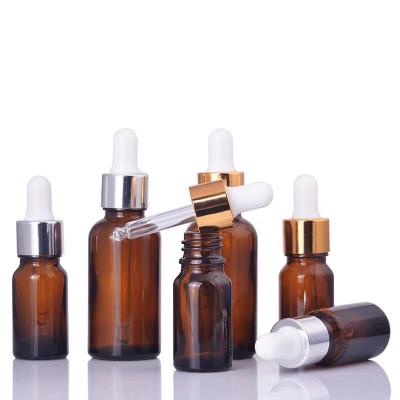 China Cosmetic in stock 5ml 10ml 15ml 20ml 30ml 50ml 100ml empty clear glass essential oil dropper bottles for sale