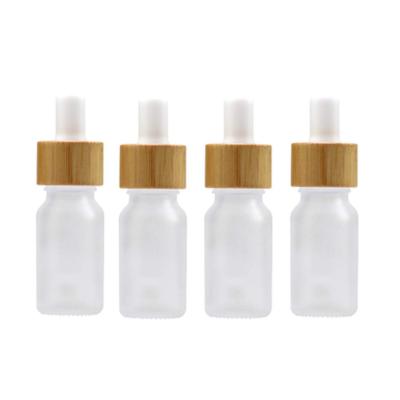 China Matte Empty Facial Serum Pipette Cosmetic Bottle Collar Essential Oil Dispenser Bamboo Glass Bottles With Dropper for sale