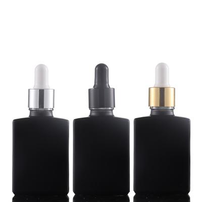 China Square Essential Oil Bottle Serum Glass Bottle 30ml Cosmetic Wholesale Essential Oil Bottle With Dropper for sale