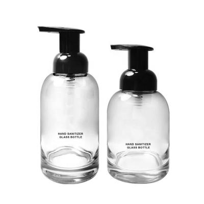 China Hot Selling Good Food Quality 250/375ml Customized Round Under Hand Glass Sanitizer Bottle for sale