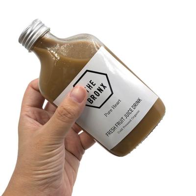 China Food Quality Assurance Beverage Bottle 200ml 250ml Cold Brew Coffee Glass Flat Bottle for sale