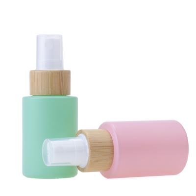 China Cosmetic Free Sample In Stock 30ml Shoulder Pack Glass Cylinder Flat Mist Spray Cosmetic Bottle for sale