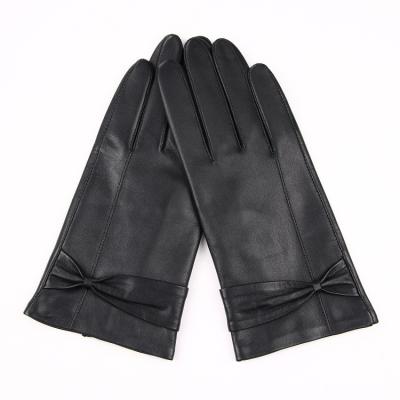 China Beautiful Single Bow Women's Top Grade Sheepskin Gloves for sale