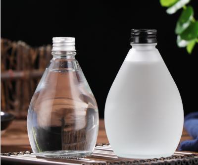 China 500ml Beverage Frosted Thickened Crystal White Glass Jug Bottle for sale